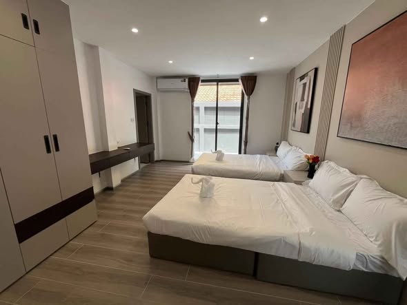 bedroom and room interior of Eakmongkol Village Pattaya
