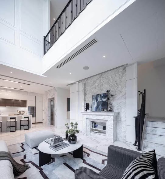 living room and kitchen of Ekamai Luxury Home
