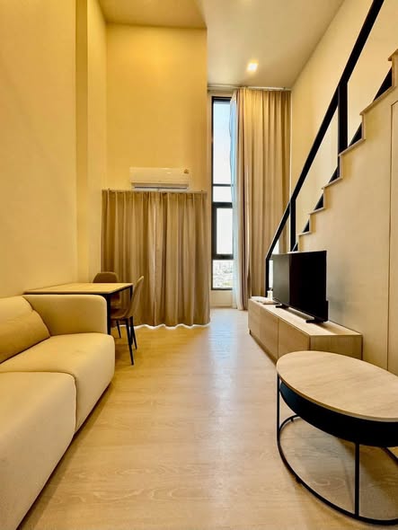 living room and bedroom of FLO by Sansiri