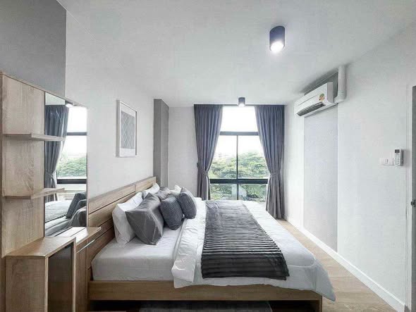 bedroom of G HAUS Condominium Santikham 4