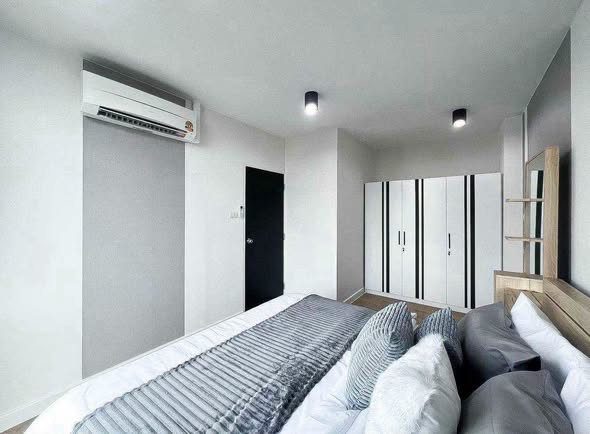 bedroom of G HAUS Condominium Santikham 4