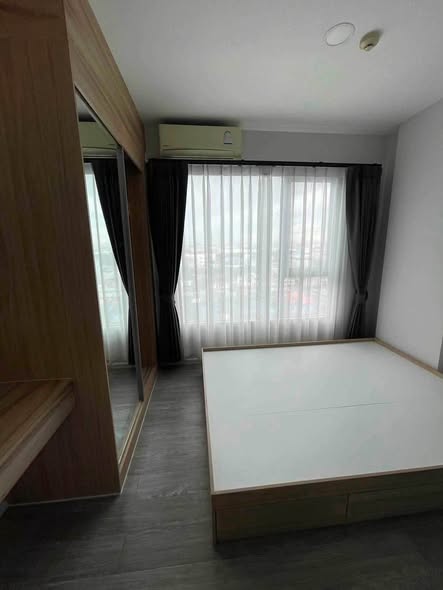 bedroom of Happy Condo Don Mueang The Terminal