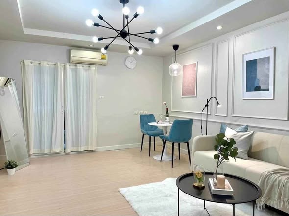 bedroom and living room of Happy Condo Rachada 18