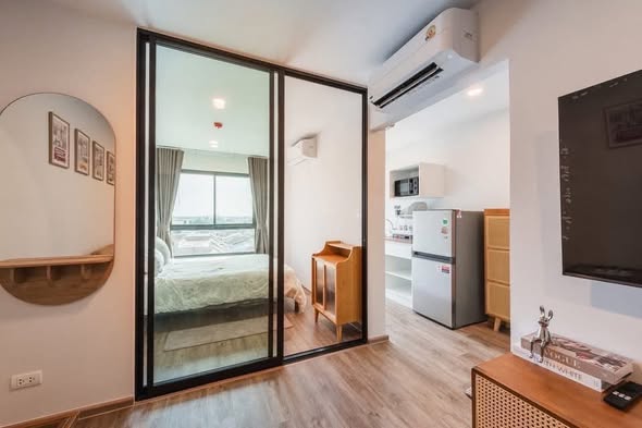 bedroom and room interior of HI Kaset-Sena Nikhom Station by AOS