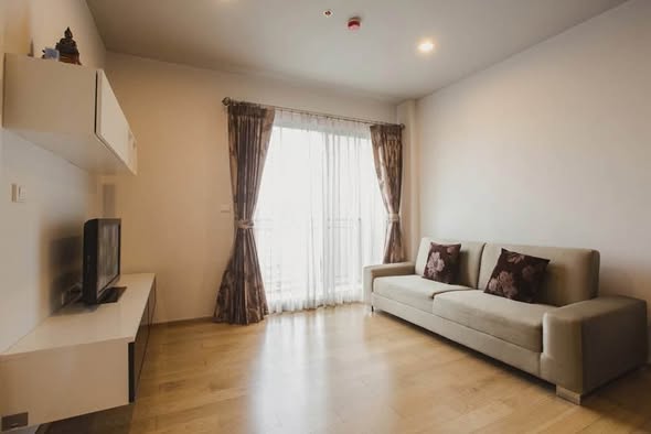 bedroom and living room of Hive Sathorn