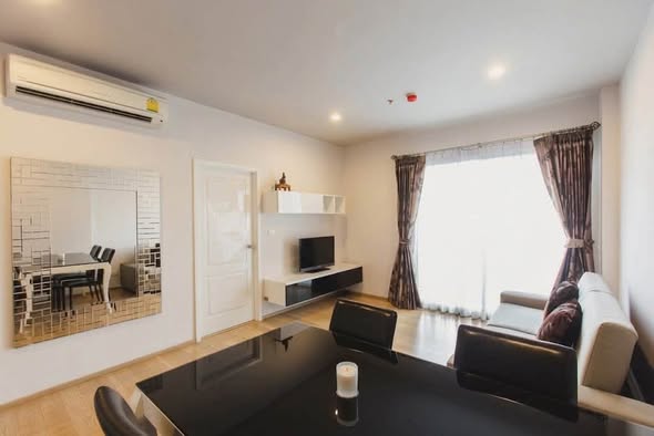living room and bedroom of Hive Sathorn