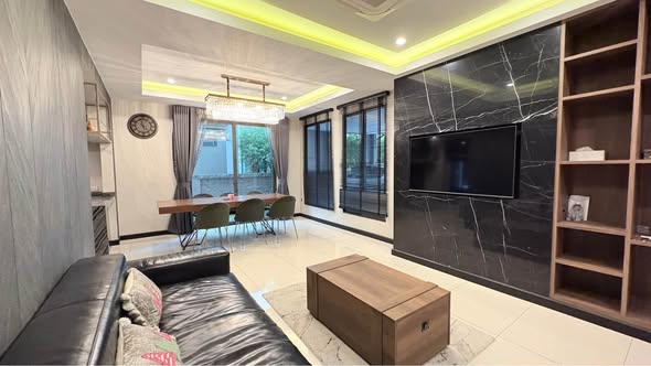 living room and bedroom of House No. 1