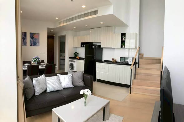 living room and kitchen of HQ by Sansiri