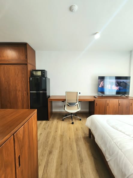 bedroom and room interior of i-House Laguna Garden RCA – Building A (Blue)