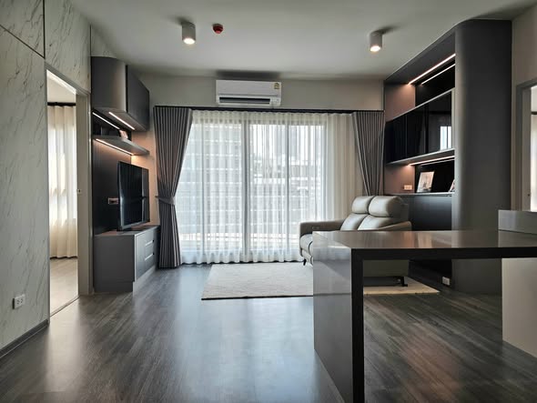 bedroom and living room of IDEO Chula-Sam Yan