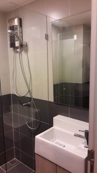 bathroom of Ideo Mobi Charan Interchange Condominium