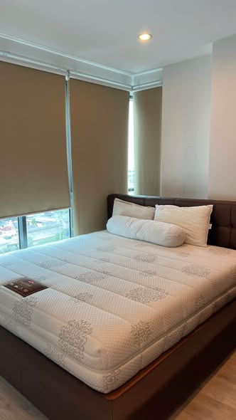 bedroom of Ideo Mobi Charan Interchange Condominium