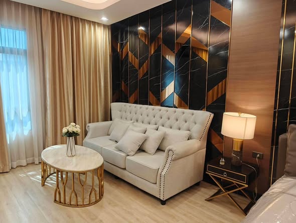 bedroom and living room of InHOME Luxury Residences
