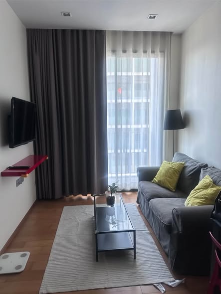 living room and bedroom of Keyne by Sansiri