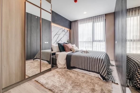 bedroom and room interior of Knightsbridge Collage Sukhumvit 107