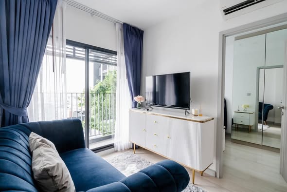 living room and bedroom of KnightsBridge Prime Sathon
