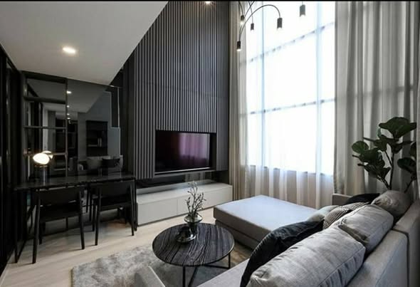 living room and bedroom of KnightsBridge Prime Sathon