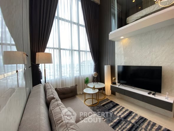 living room and bedroom of KnightsBridge Prime Sathon