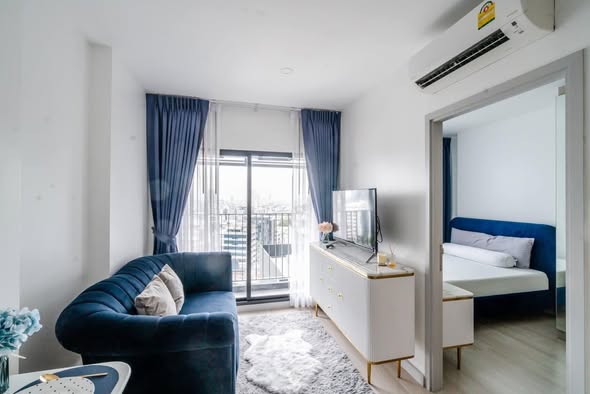 living room and bedroom of KnightsBridge Prime Sathon
