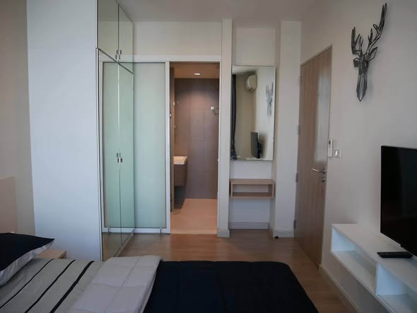 bedroom and room interior of KPN The Capital Condo