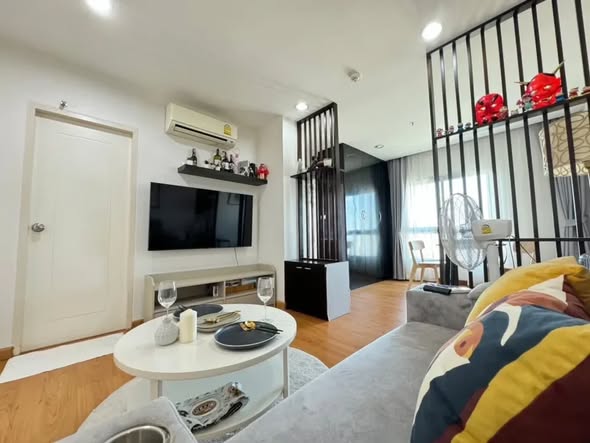 bedroom and living room of Le Rich Condo