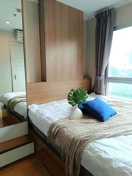 bedroom and room interior of Lumpini Place Srinagarindra – Hua Mak Station