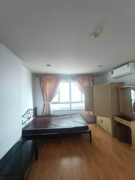 bedroom of Lumpini Ville Cultural Center