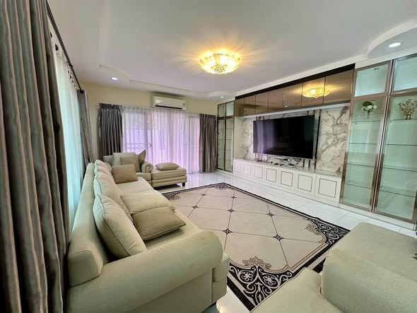 bedroom and living room of LUXURY HOME VILLAS LTD