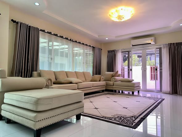 bedroom and living room of LUXURY HOME VILLAS LTD