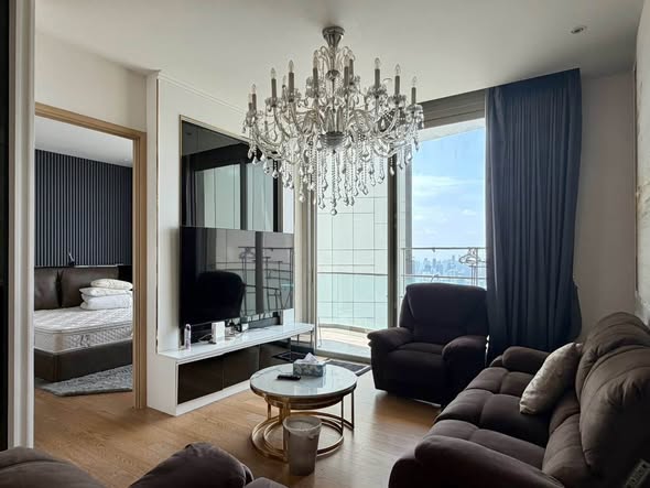 bedroom and living room of Magnolias Waterfront Residences