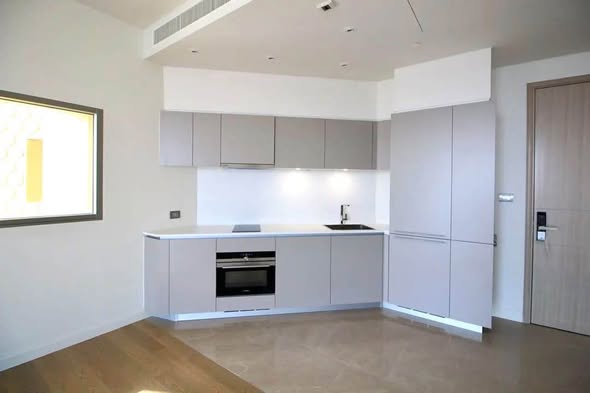 room interior and kitchen of Magnolias Waterfront Residences