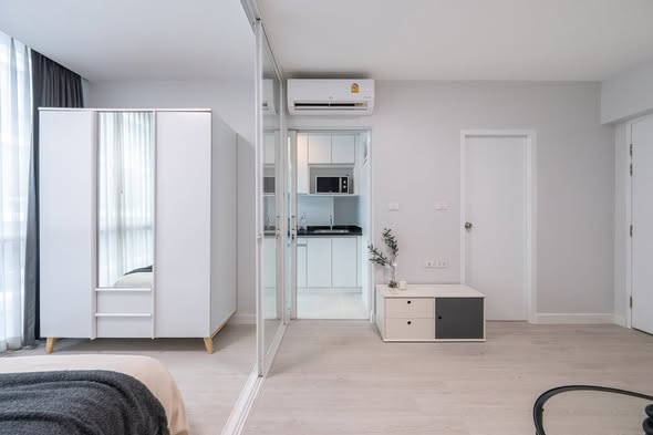 bedroom and room interior of Max Condominium