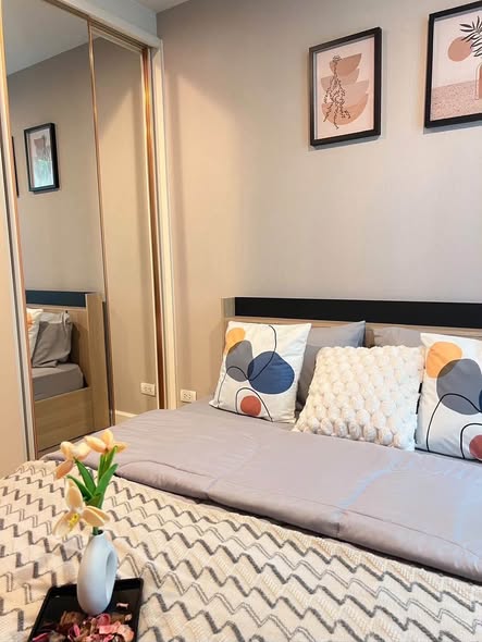 bedroom of Metro Luxe Riverfront Rattanathibet