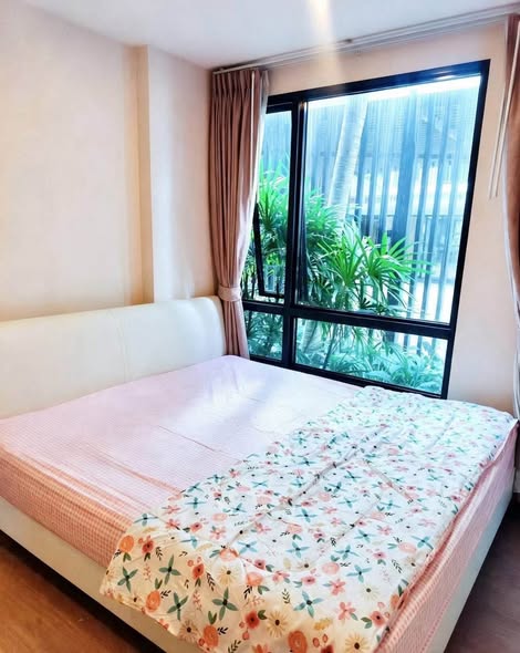 bedroom of Metro Luxe Riverfront Rattanathibet