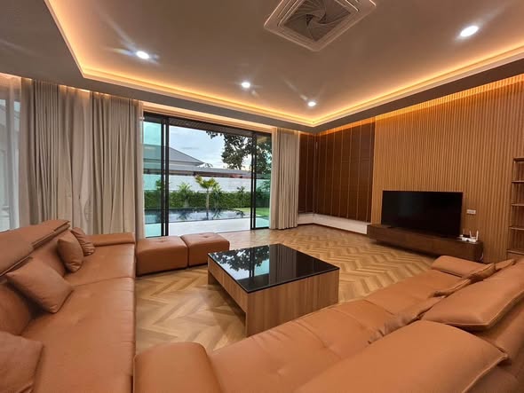 bedroom and living room of Moon 5-Bedroom Luxury Pool Villa