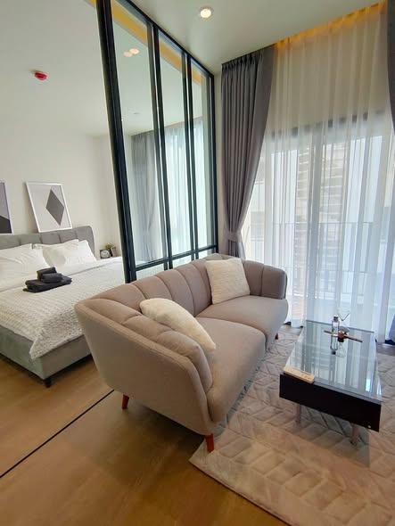 bedroom and living room and room interior of MUNIQ Sukhumvit 23