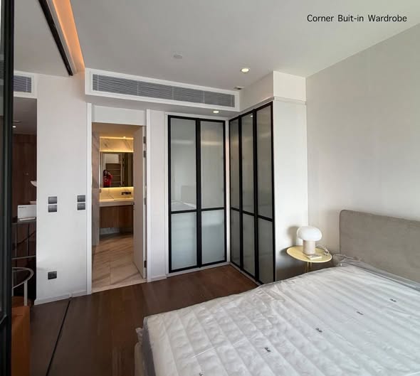 bedroom and room interior of MUNIQ Sukhumvit 23