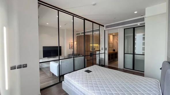 bedroom and room interior of MUNIQ Sukhumvit 23