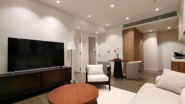 living room and bedroom of MUNIQ Sukhumvit 23