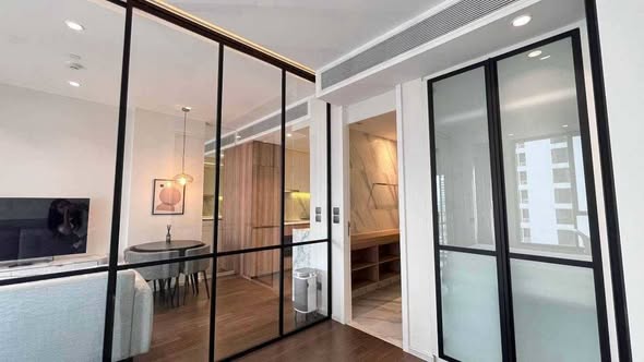 living room and room interior of MUNIQ Sukhumvit 23