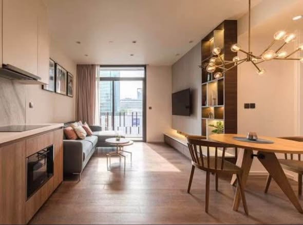 living room and room interior and kitchen of MUNIQ Sukhumvit 23