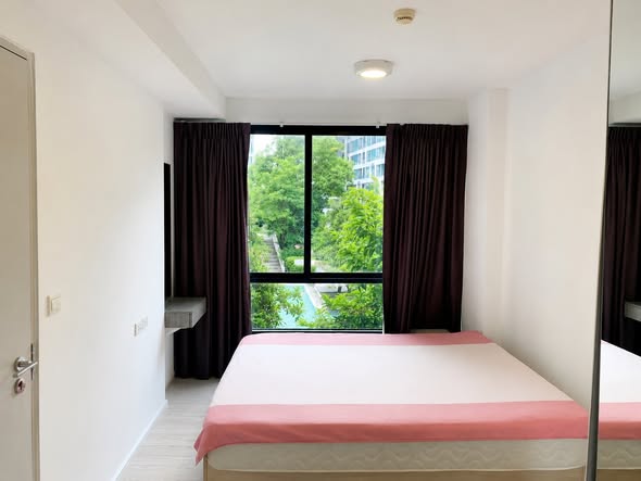 bedroom of My Story Condo