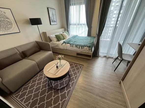 bedroom and living room of NIA by Sansiri
