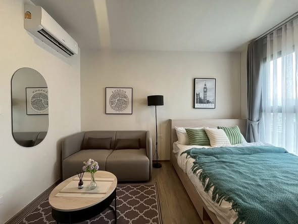 bedroom and living room of NIA by Sansiri