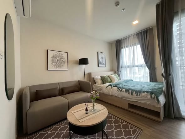 bedroom and living room of NIA by Sansiri