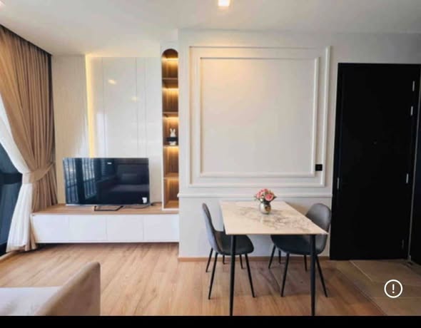 bedroom and living room of Noble Around Ari
