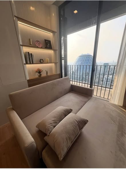 bedroom and living room of Noble Around Ari