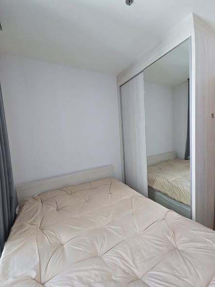 bedroom of Noble Revolve Ratchada 2