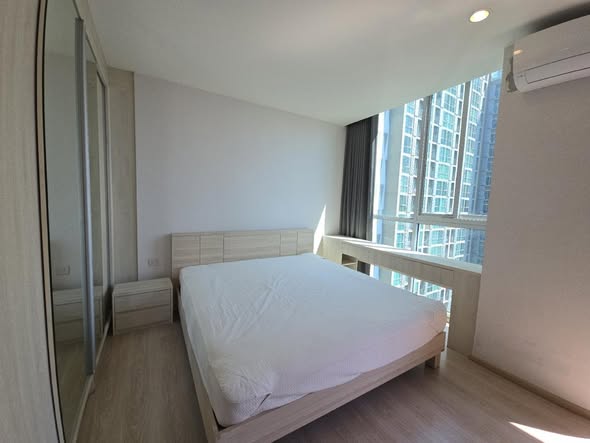 bedroom of Noble Revolve Ratchada 2