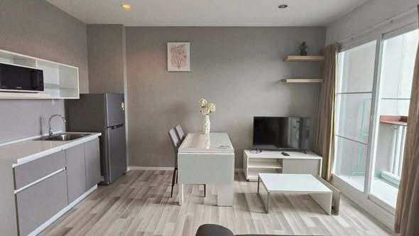 living room and bedroom of North 4 Condo นอร์ท 4 คอนโด